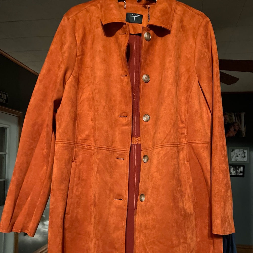 Tahari faux leather jacket. New with tags. Very nice!